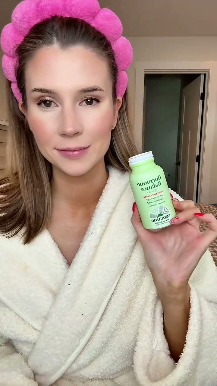 Semaine portrait with a Hormone Balance bottle