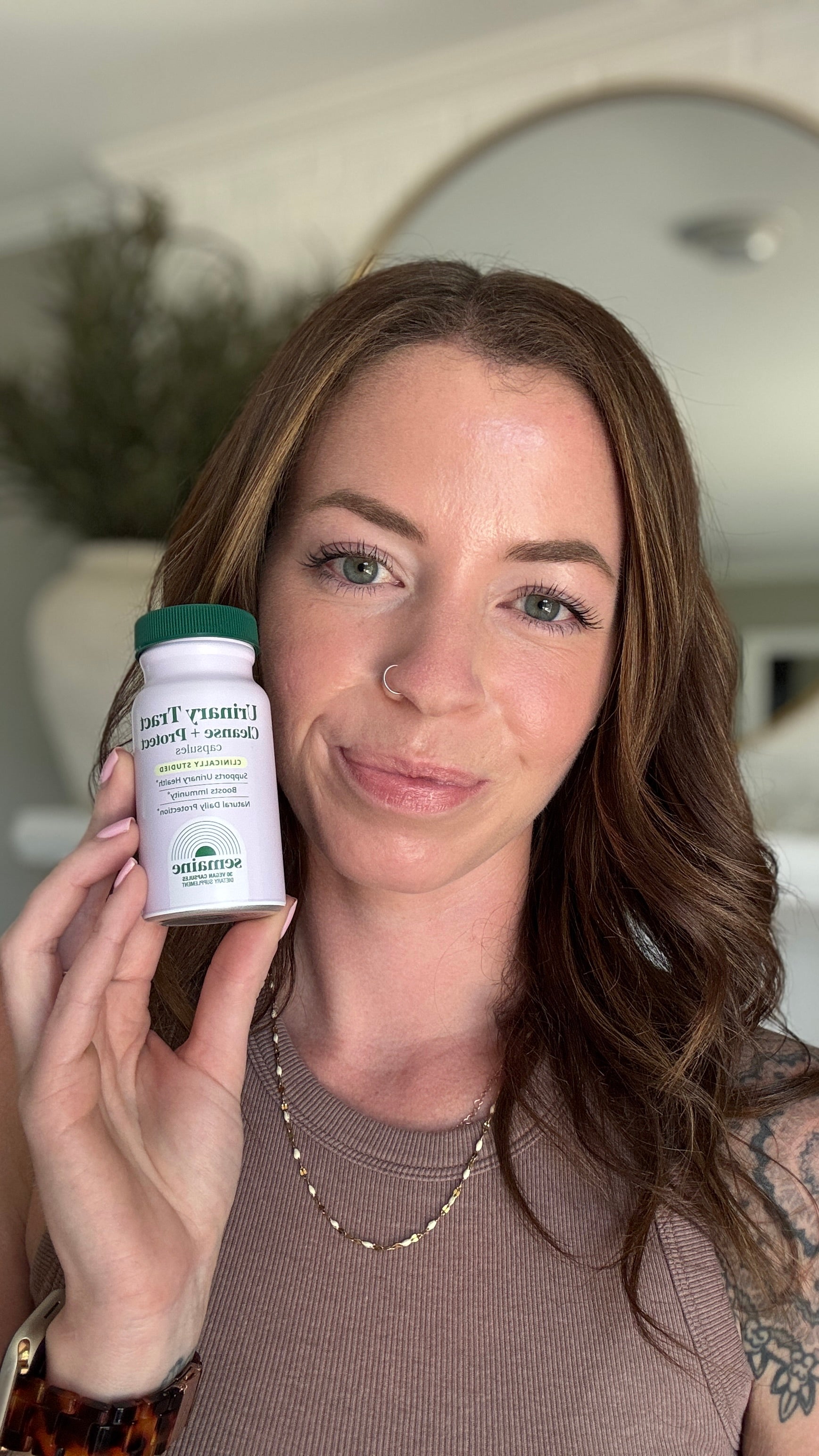 Shelby holding Urinary Tract Cleanse & Protect