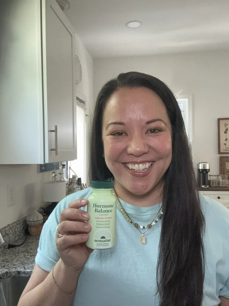 Semaine portrait with a Hormone Balance bottle