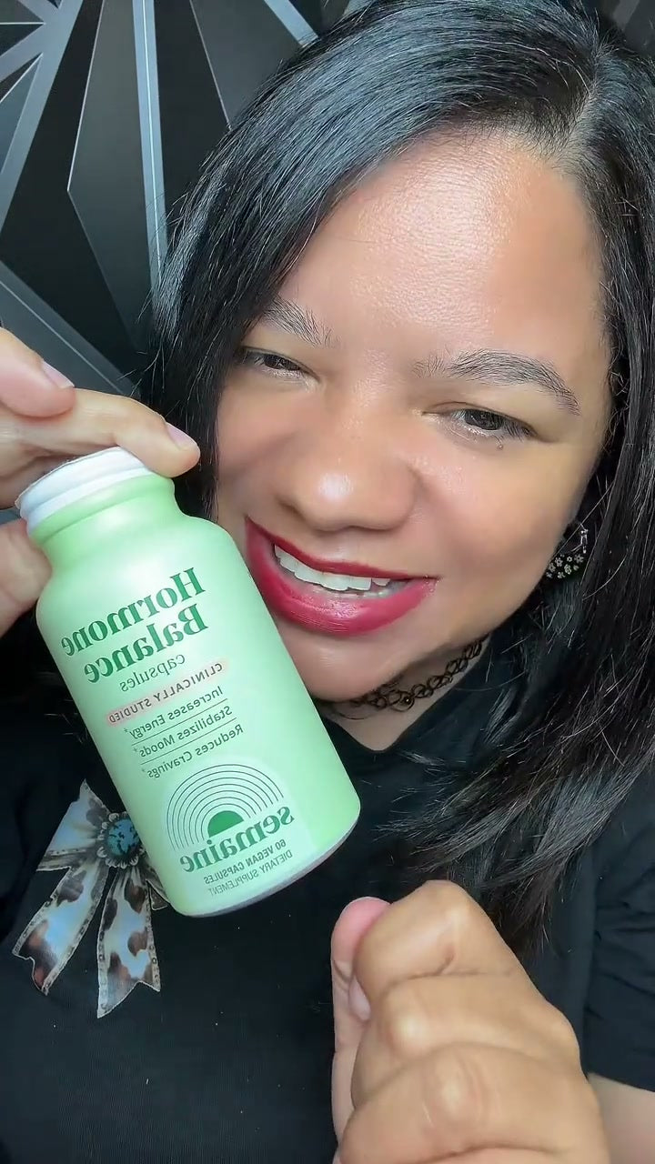 Semaine portrait with a Hormone Balance bottle