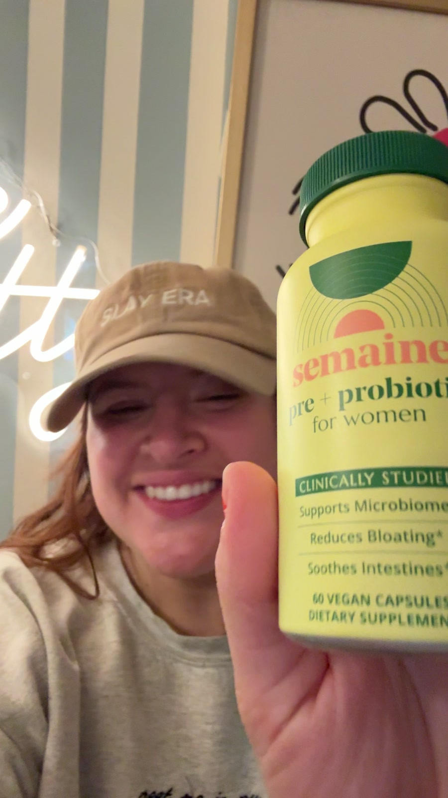 Korinne holding Pre + Probiotic