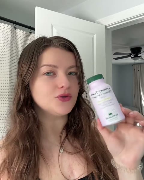 Brittney holding Urinary Tract Cleanse & Protect