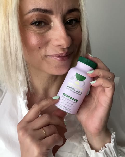 Laura holding Urinary Tract Cleanse & Protect
